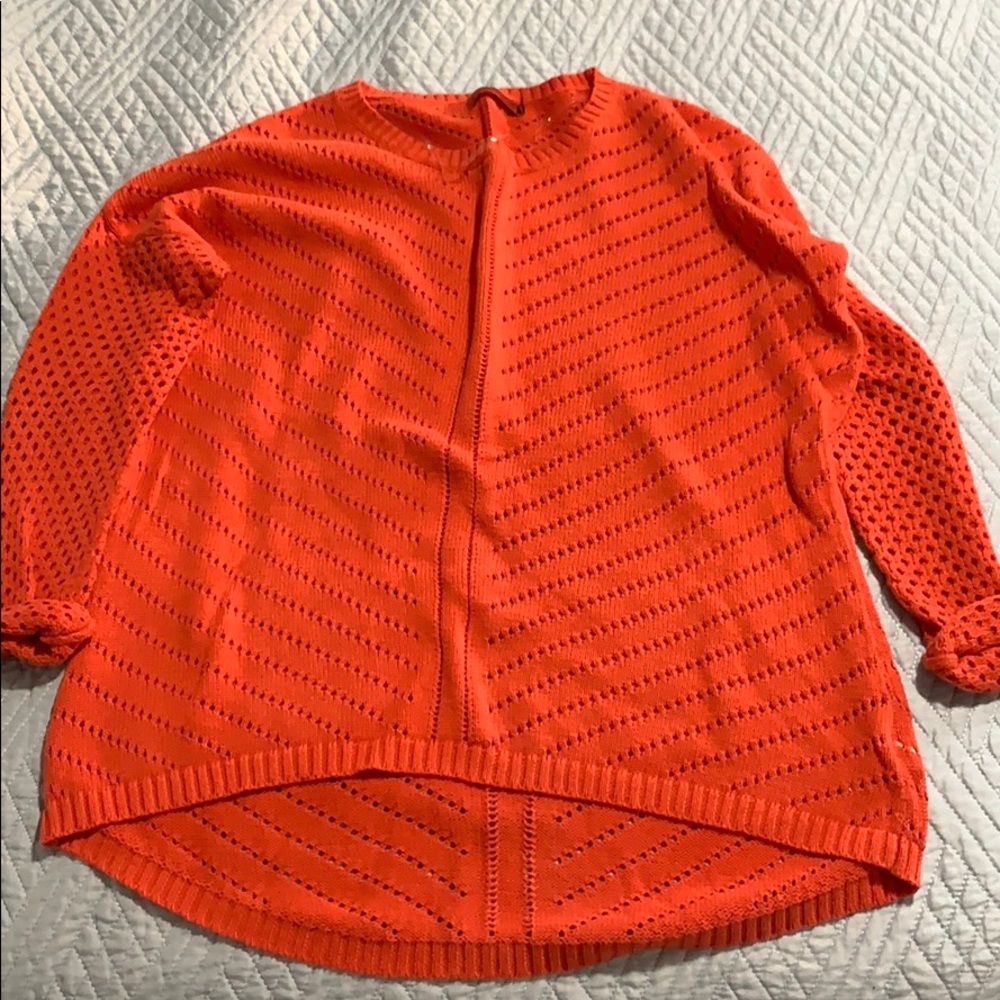 Red athleisure sweater